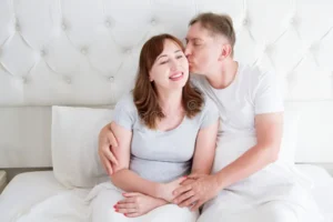 middle-age-family-couple-white-bedroom-bed-husband-kiss-wife-love-romance-healthy-relationship-middle-age-family-couple-128238644-300x200